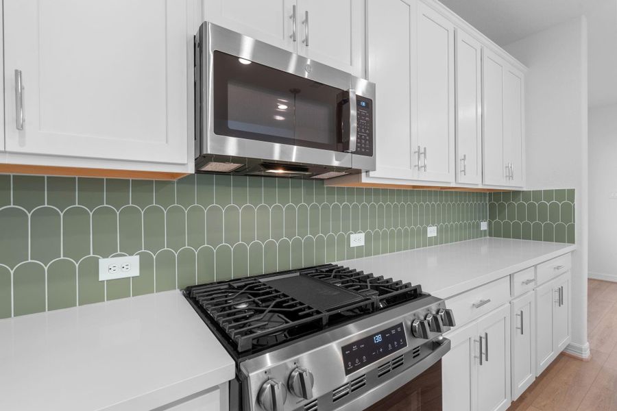 This kitchen is not only a functional space but also has ample storage. Whether you're a seasoned chef or just love to gather and enjoy good food, this kitchen is a dream come true.