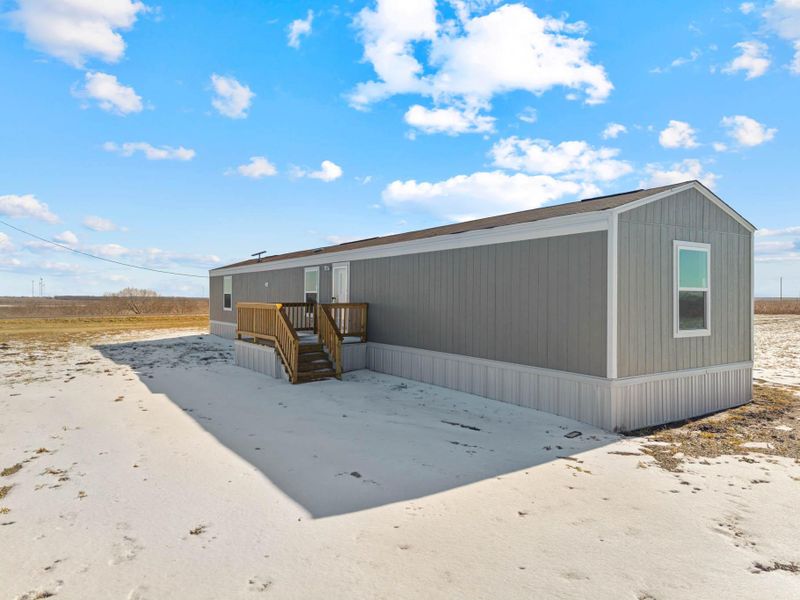 Exterior details and patio area of a home in , Dawson (Image 2). Exterior details and patio area of a home in , Dawson (Image 2).