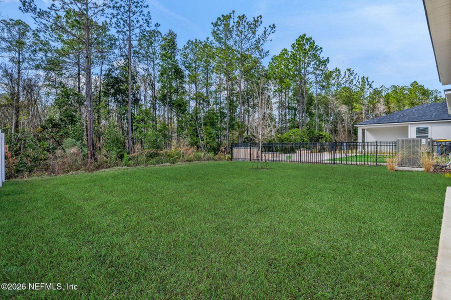 Exterior details and patio area of a home in Cedar Creek, Jacksonville (Image 25).