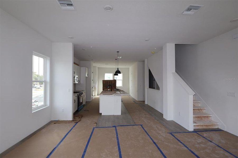 In-progress construction of a new home in Towns at Union, St. Petersburg, FL (Image 10).