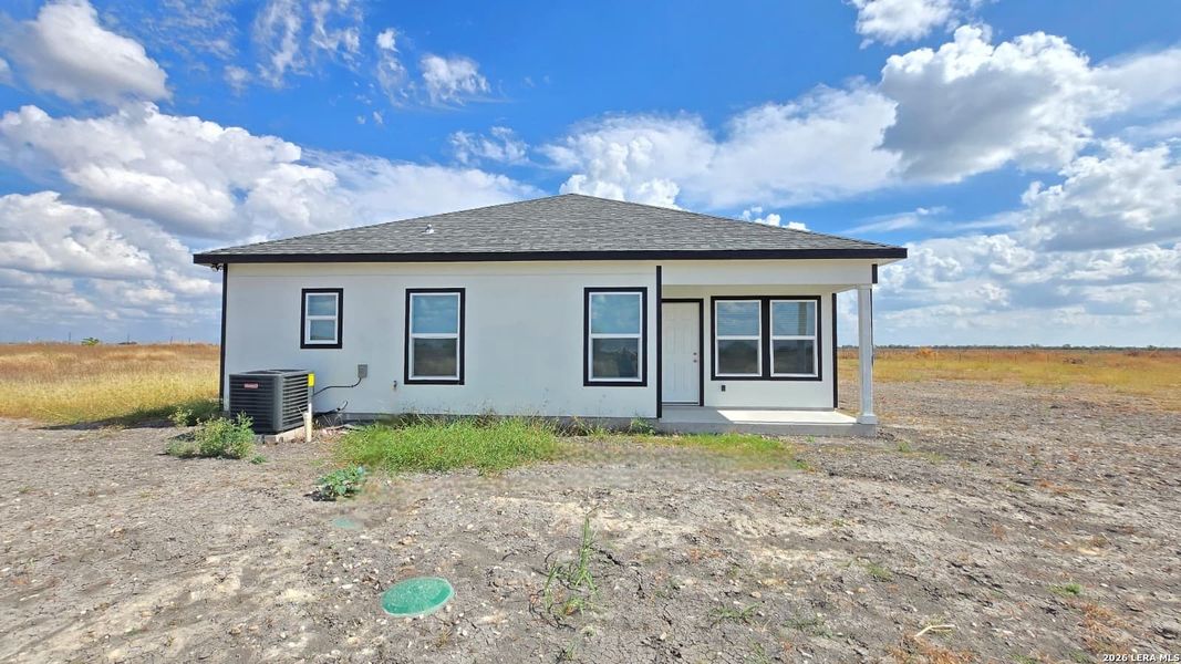 Exterior details and patio area of a home in , D'Hanis (Image 3).
