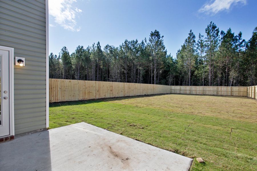 Representative exterior photo of a completed home built from the The Ryon by RTS Homes in Grand Reserve, Hinesville, GA (Image 22).