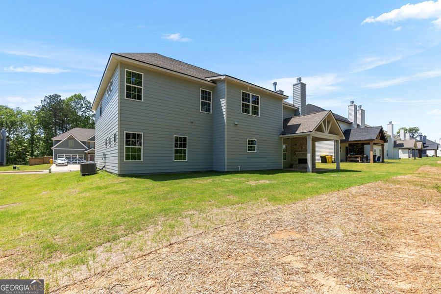 Exterior details and patio area of a home in Juliette Crossing, Forsyth (Image 36).