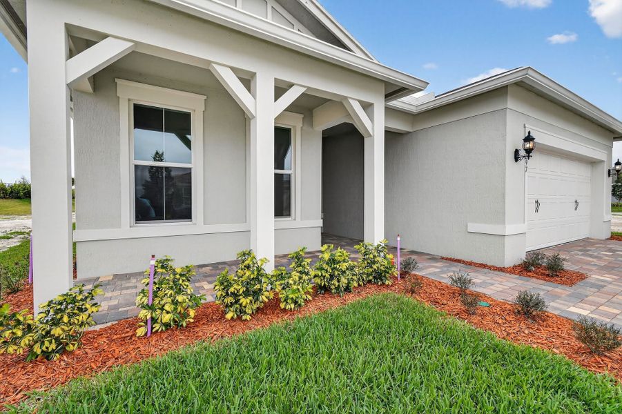Exterior details and patio area of a home in Del Webb Tradition, Port St. Lucie (Image 36).