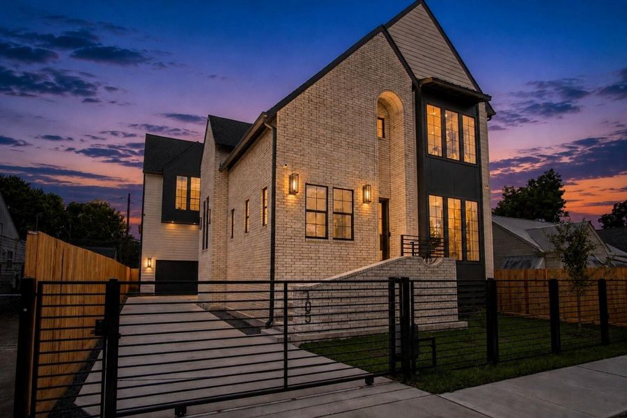 Front exterior of a new home in , Houston, TX, highlighting curb appeal (Image 1). Front exterior of a new home in , Houston, TX, highlighting curb appeal (Image 1).