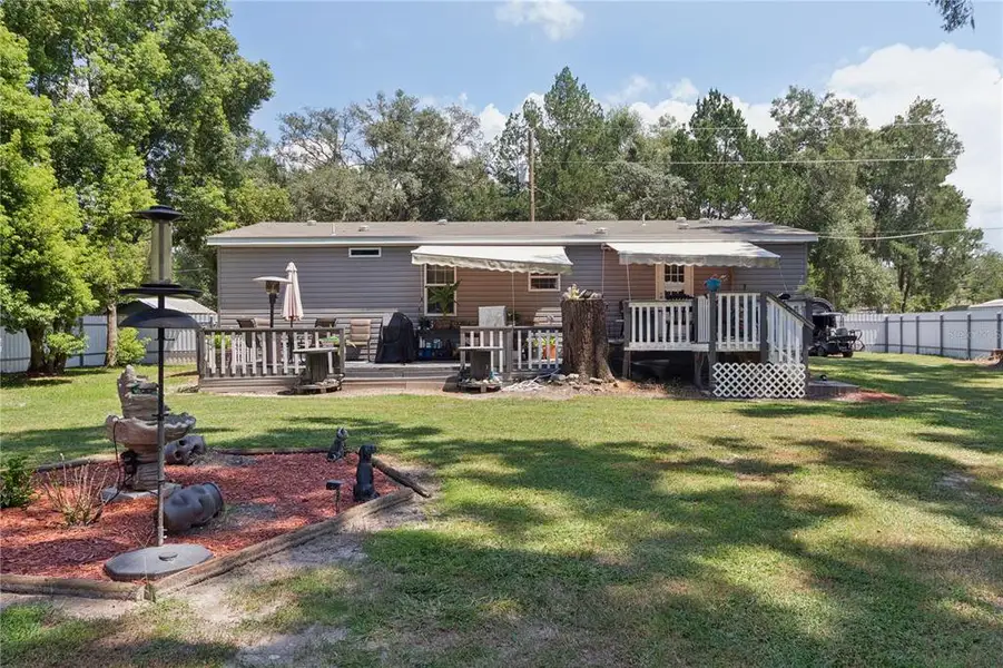 Exterior details and patio area of a home in , Spring Hill (Image 23).