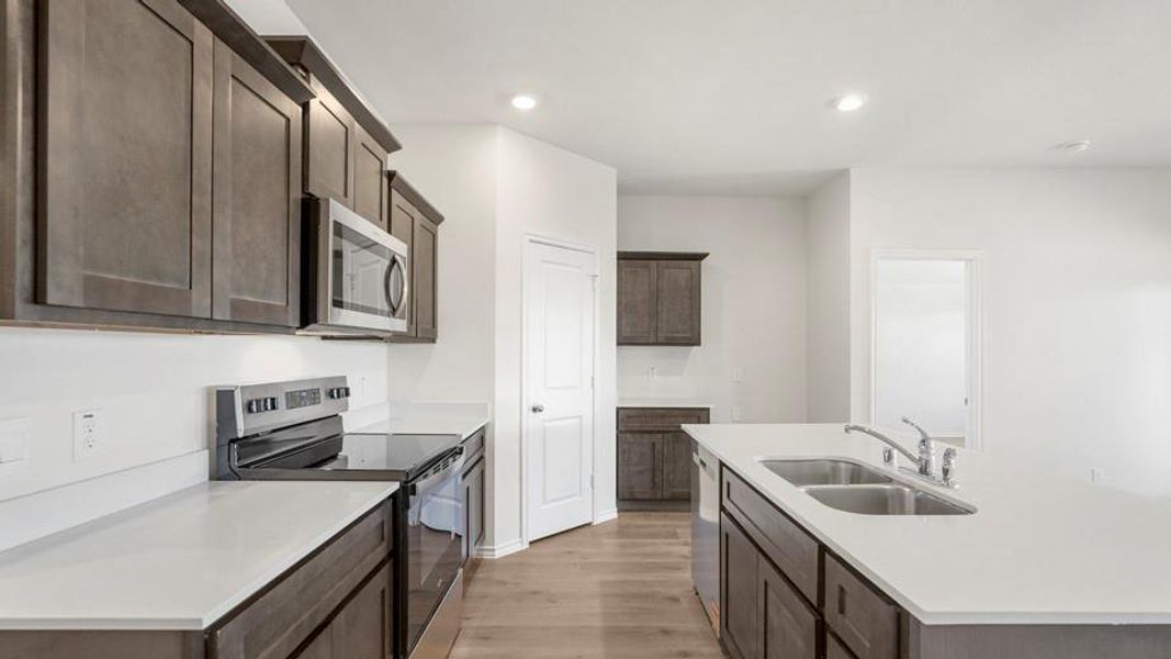 Furnished interior view inside a new home in Creeks at Burnett Trail, Canton (Image 6). Furnished interior view inside a new home in Creeks at Burnett Trail, Canton (Image 6).