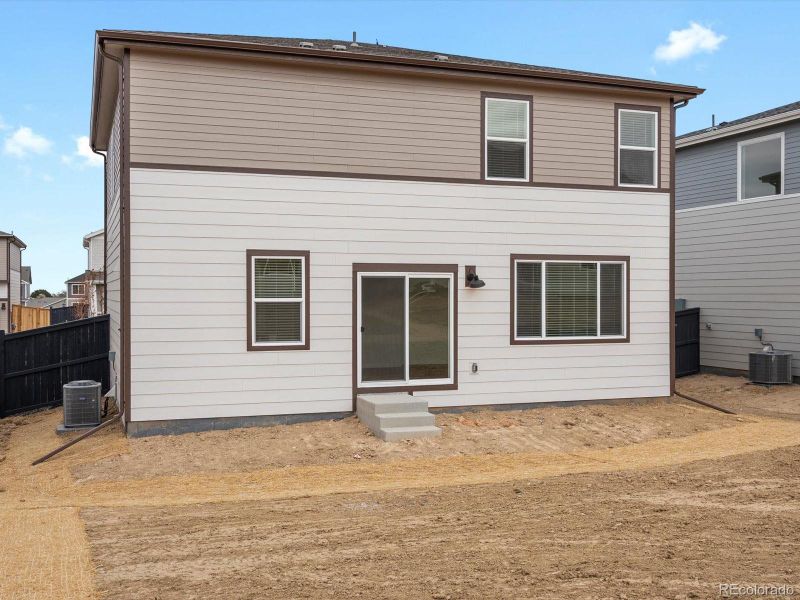 Exterior details and patio area of a home in Westgate, Greeley (Image 3).