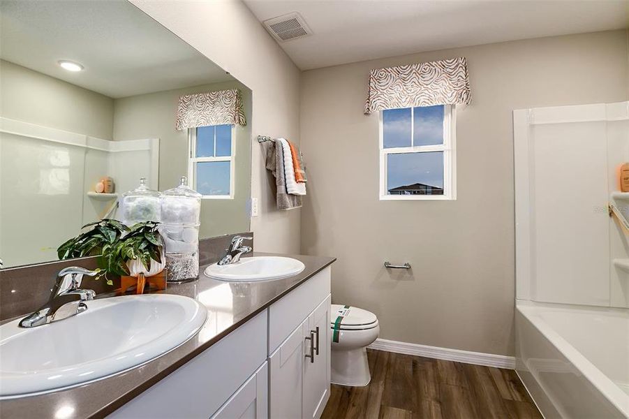 Furnished interior view inside a new home in Pasadena Landing, Wesley Chapel (Image 13).