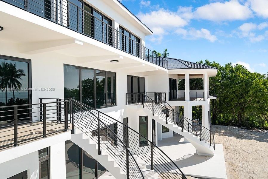 Mirrored Staircases from 2nd Floor to Pool Area Mirrored Staircases from 2nd Floor to Pool Area