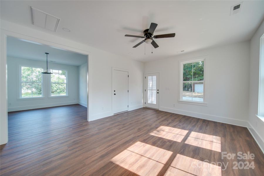 GREAT ROOM LOOKING INTO DINING ROOM