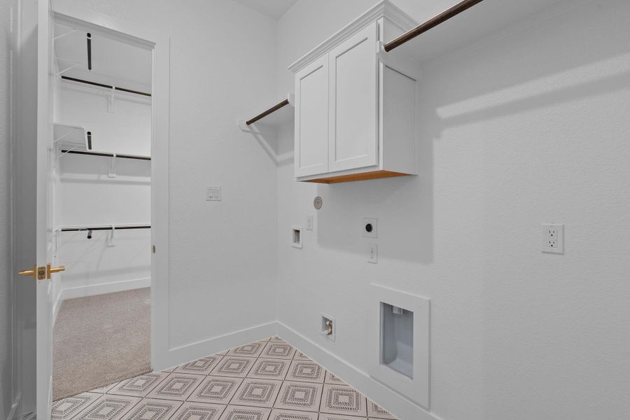 Direct access from the main closet into the utility room Direct access from the main closet into the utility room