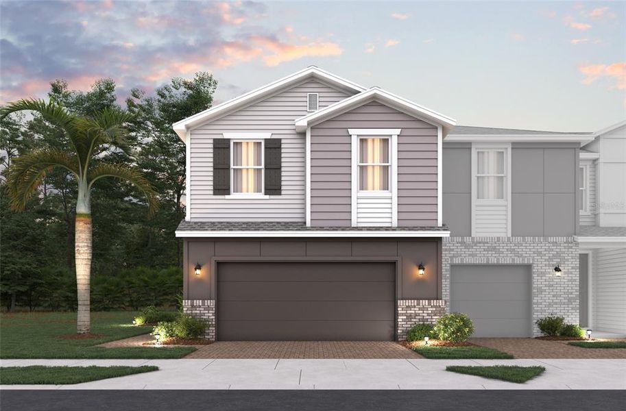 Front exterior of a new home in Towns at Riverwalk: Lake Monroe TH, Sanford, FL, highlighting curb appeal (Image 1). Front exterior of a new home in Towns at Riverwalk: Lake Monroe TH, Sanford, FL, highlighting curb appeal (Image 1).