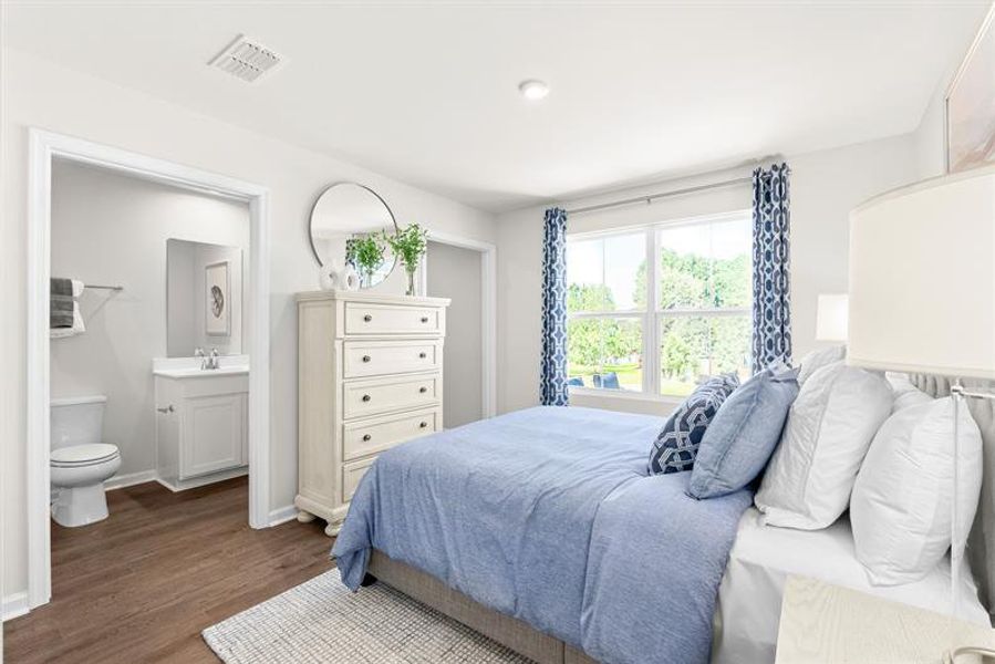 Representative furnished interior of a home built from the Ellis by Ryan Homes in Middle Creek Village Coastal Cottages & Villas, Bolivia (Image 18).