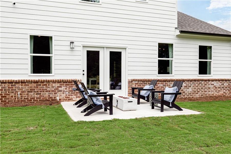 Exterior details and patio area of a home in River Oaks, Locust Grove (Image 2).