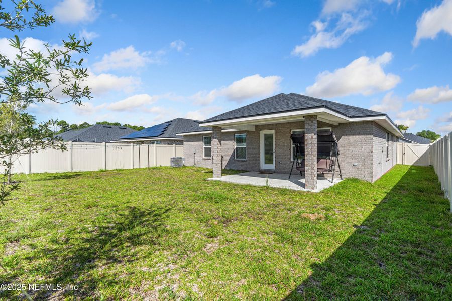 Front exterior of a new home in Shadow Crest at Rolling Hills, Green Cove Springs, FL, highlighting curb appeal (Image 18).