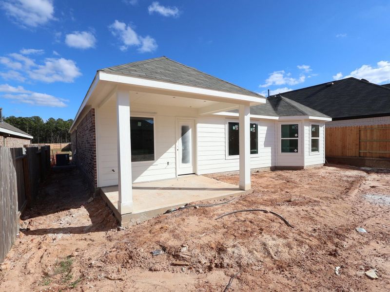Exterior details and patio area of a home in Magnolia Ridge, Magnolia (Image 3). Exterior details and patio area of a home in Magnolia Ridge, Magnolia (Image 3).
