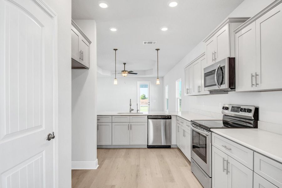 Furnished interior view inside a new home in The Bluffs at Lafayette, Freeport (Image 4).