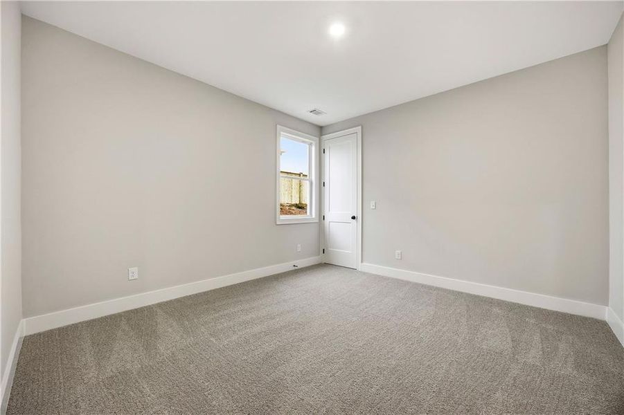 Spacious, unfurnished interior of a new home in Yellowstone Farms, Cumming (Image 23).
