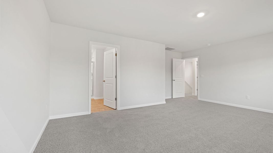 Spacious, unfurnished interior of a new home in Bentley Park, Greenwood (Image 30). Spacious, unfurnished interior of a new home in Bentley Park, Greenwood (Image 30).