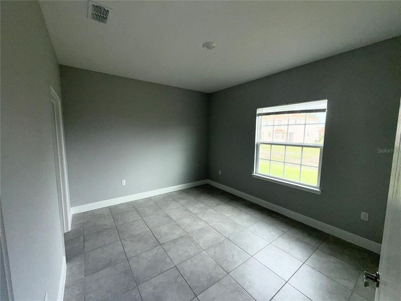 Spacious, unfurnished interior of a new home in Tuscany Preserve, Kissimmee (Image 6).