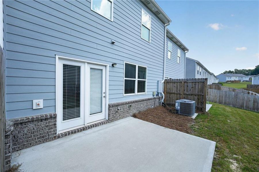 Exterior details and patio area of a home in , Buford (Image 3). Exterior details and patio area of a home in , Buford (Image 3).