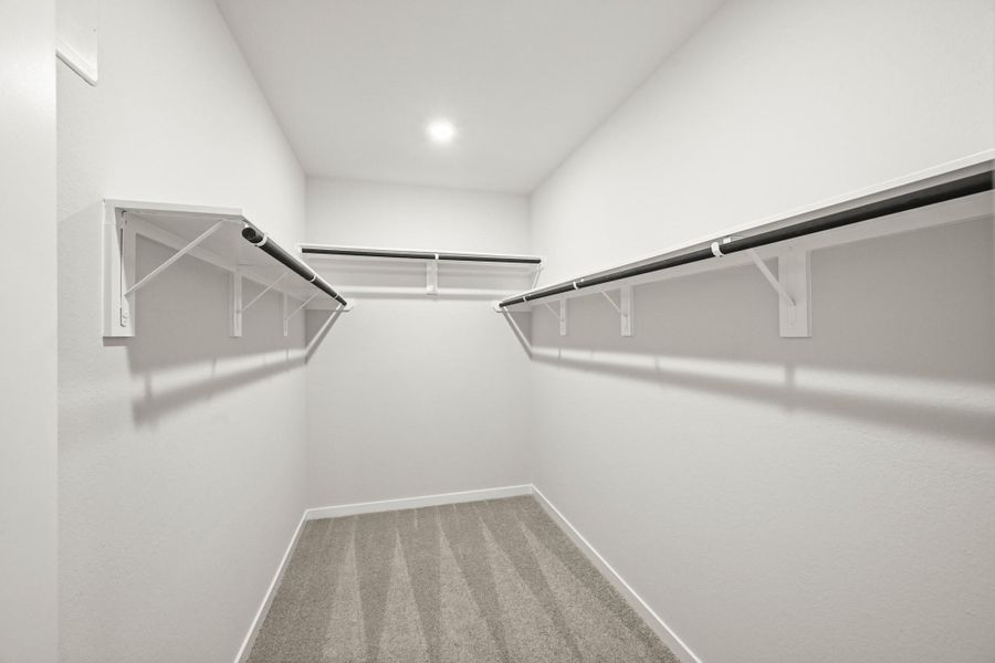 Spacious, unfurnished interior of a new home in Sunterra, Katy (Image 23).