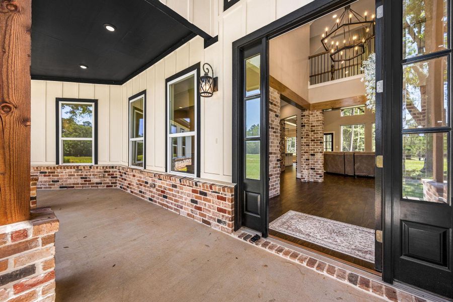 Exterior details and patio area of a home in , New Waverly (Image 3).