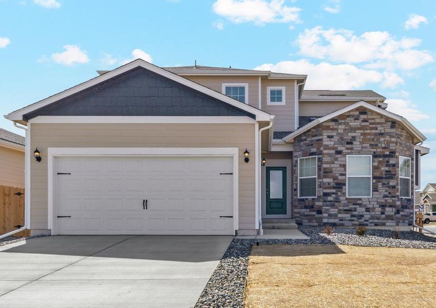 The Ponderosa is a beautiful two story home with stone.