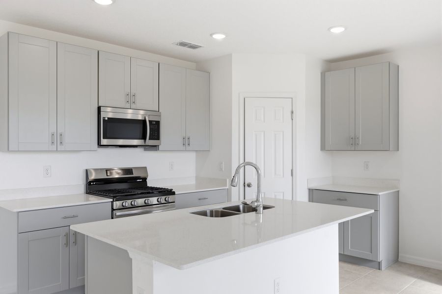 Furnished interior view inside a new home in Highfield at Twisted Oaks, Wildwood (Image 3).