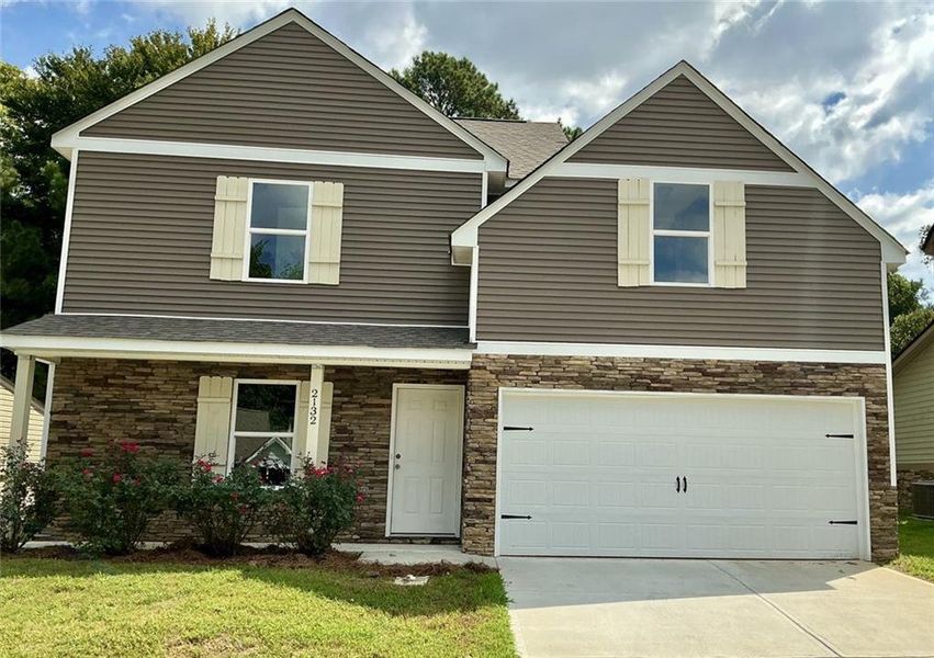 Front exterior of a new home in , Gainesville, GA, highlighting curb appeal (Image 12).