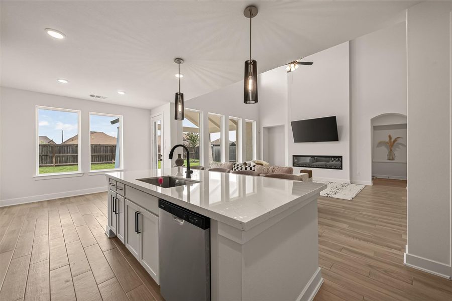 The open kitchen and breakfast area provide the perfect gathering space for family and friends. The open kitchen and breakfast area provide the perfect gathering space for family and friends.