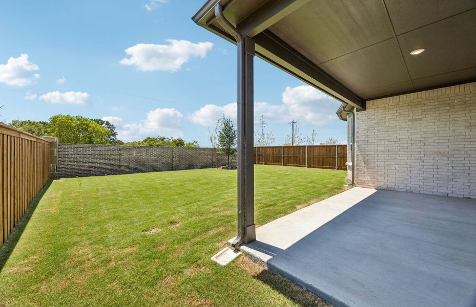 Exterior details and patio area of a home in Highland Lakes, McKinney (Image 2).