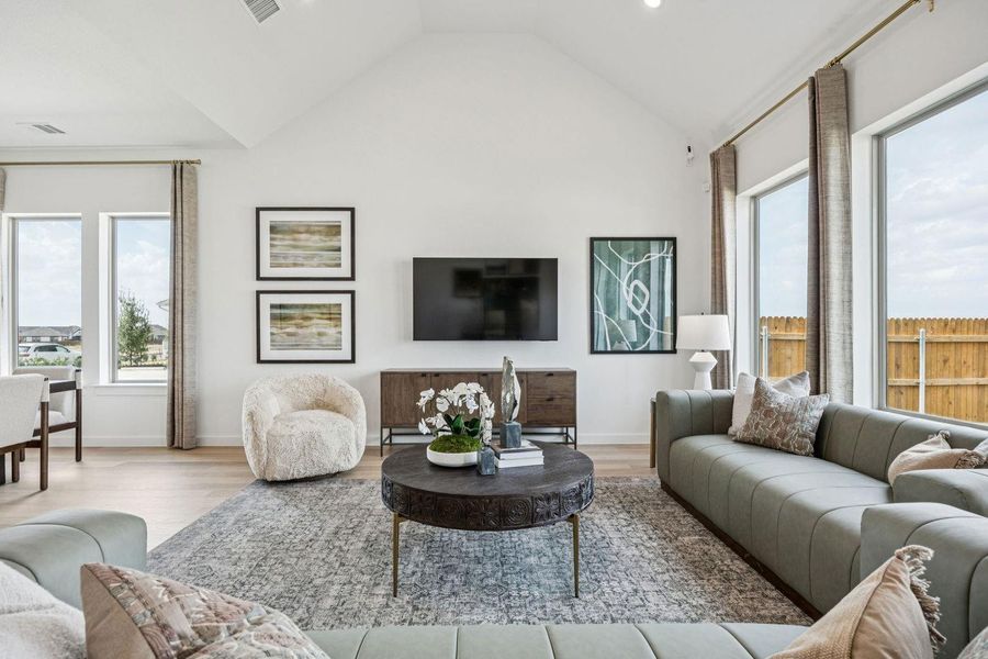 Living Room in the Trinity home plan by Trophy Signature Homes – REPRESENTATIVE PHOTO