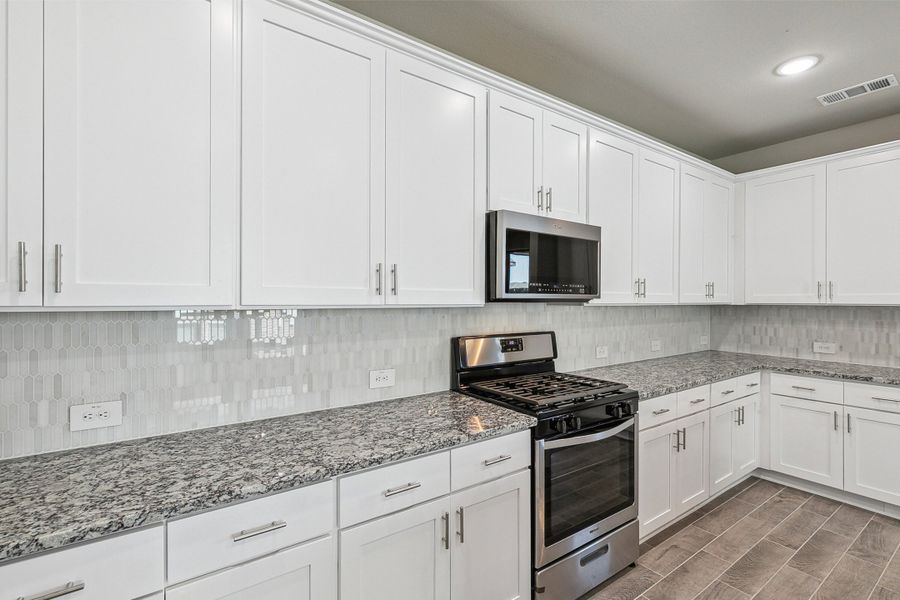 Image 3 representing the Andrew by Megatel Homes in Manors at Woodbridge, Wylie, TX. Image 3 representing the Andrew by Megatel Homes in Manors at Woodbridge, Wylie, TX.