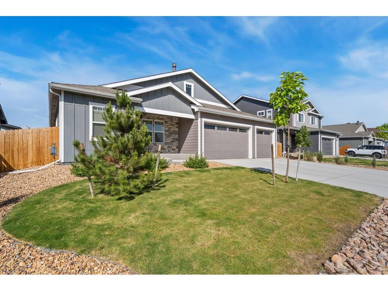 Front exterior of a new home in , Frederick, CO, highlighting curb appeal (Image 2). Front exterior of a new home in , Frederick, CO, highlighting curb appeal (Image 2).