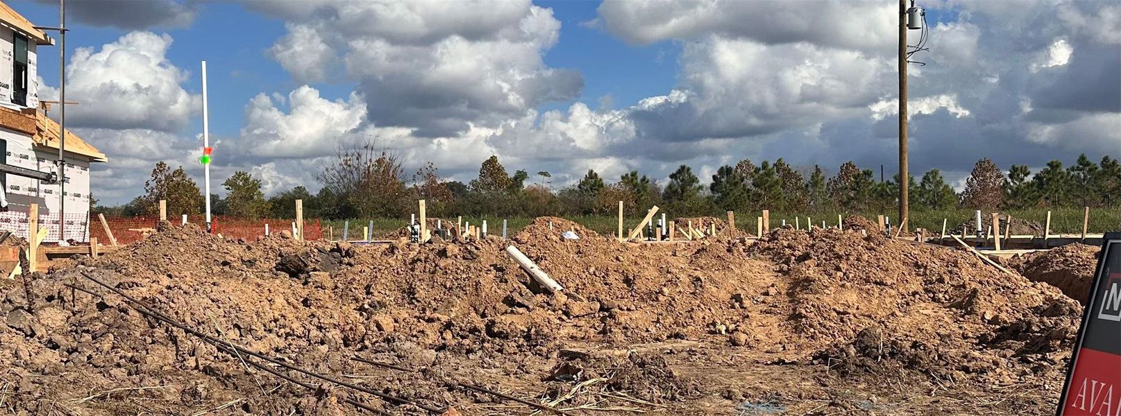 Site preparation for new homesites in , Iowa Colony (Image 4).