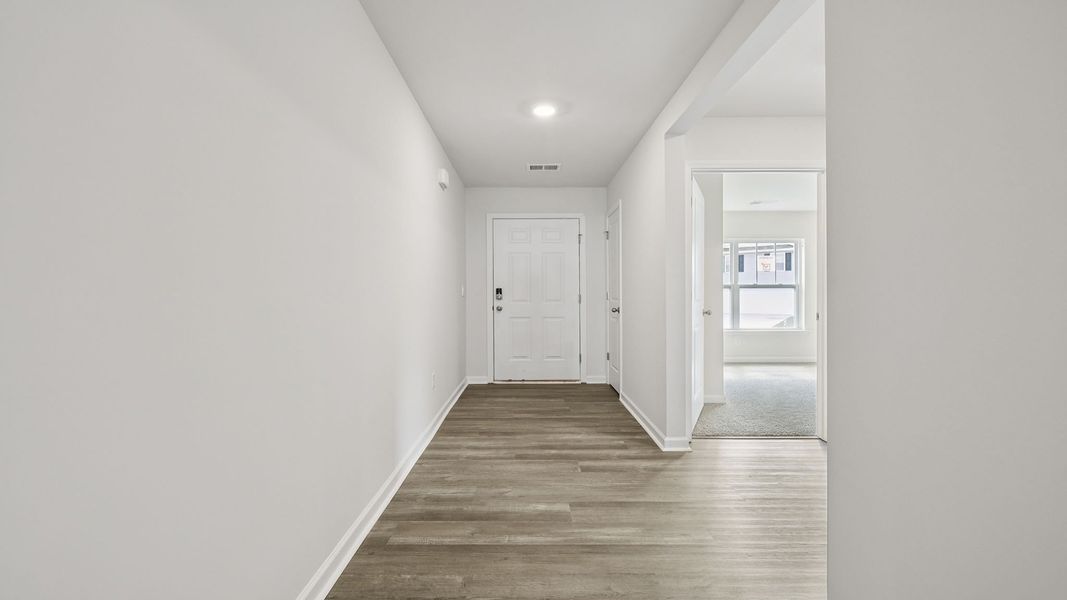 Spacious, unfurnished interior of a new home in Bentley Park, Greenwood (Image 11).