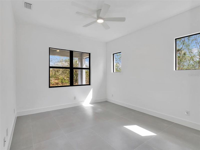 Spacious, unfurnished interior of a new home in , Port Charlotte (Image 40).