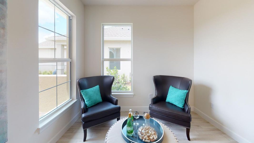 Furnished interior view inside a new home in Esplanade at Tradition, Port St. Lucie (Image 10).