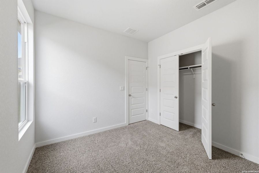 Spacious, unfurnished interior of a new home in Talley Fields, San Antonio (Image 32).