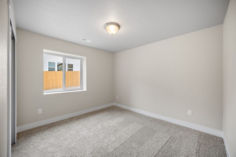 Spacious, unfurnished interior of a new home in Ridge at Lorson Ranch, Colorado Springs (Image 20).