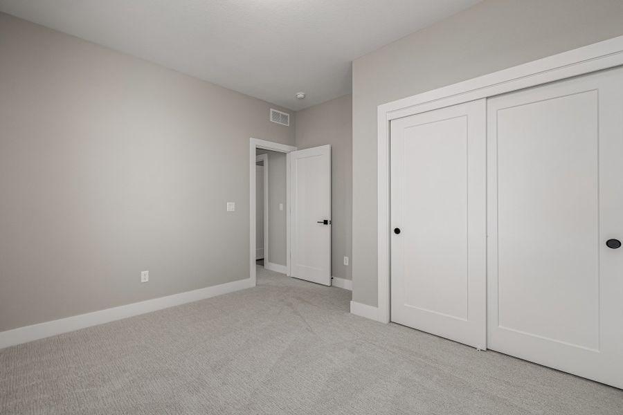 Spacious, unfurnished interior of a new home in West Grange, Longmont (Image 34).