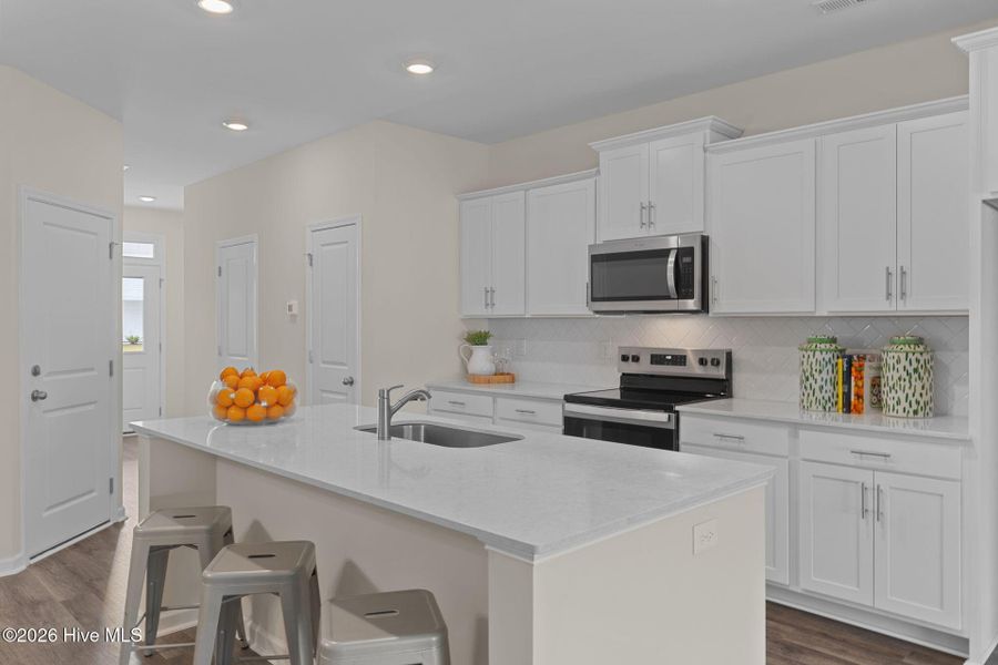 Furnished interior view inside a new home in Coastal Haven Townes, Leland (Image 7).