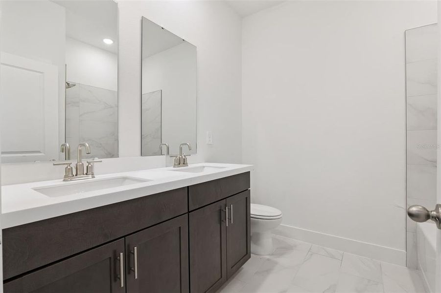 Furnished interior view inside a new home in Eden Crest, Apopka (Image 16).