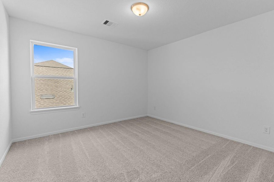 Your secondary bedroom features plush carpet, fresh paint, closet, and a large window that lets in plenty of natural lighting. Your secondary bedroom features plush carpet, fresh paint, closet, and a large window that lets in plenty of natural lighting.