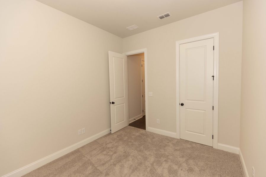 Representative unfurnished interior of a home built from the The Tensley by The Providence Group in Waterhaven, Cumming (Image 30).