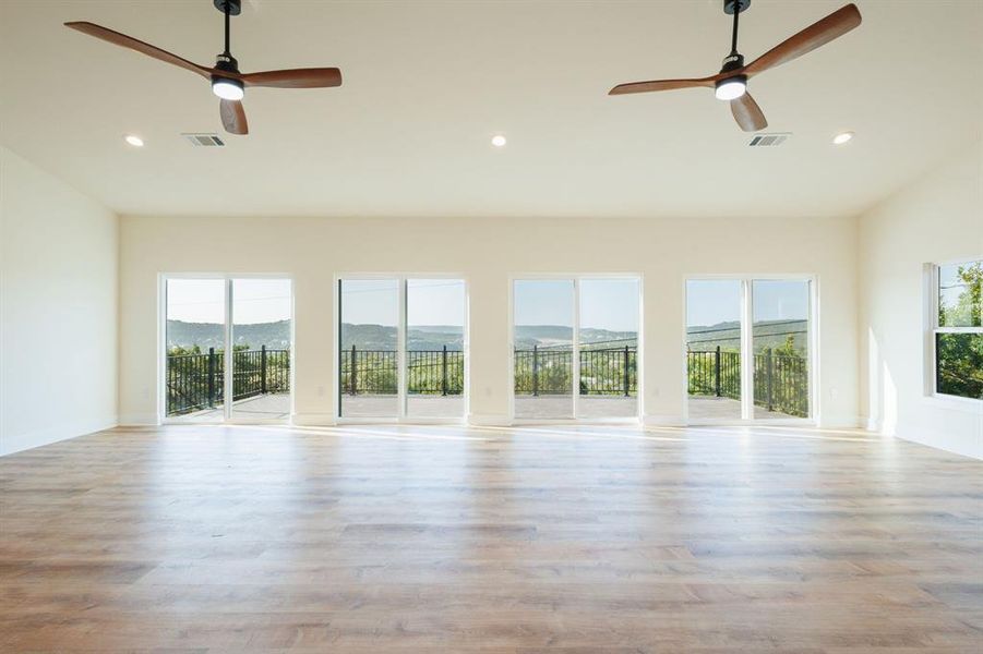 View of living room and Hill Country from kitchen