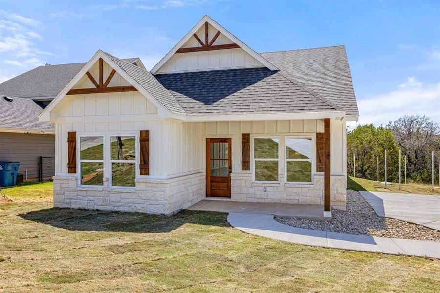 Front exterior of a new home in , Granbury, TX, highlighting curb appeal (Image 16). Front exterior of a new home in , Granbury, TX, highlighting curb appeal (Image 16).