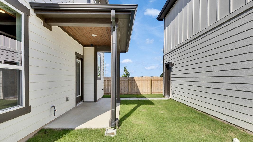 Representative exterior photo of a completed home built from the Trinity by DRB Homes in Spring Creek, Taylor, TX (Image 21). Representative exterior photo of a completed home built from the Trinity by DRB Homes in Spring Creek, Taylor, TX (Image 21).